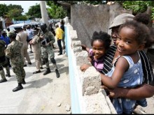 File Photos In the 2022 Gleaner photo, Daphne Campbell and her grandchildren, twins Shameila (right) and Shameil Smith, looking over their newly built wall as National Security Minister Dr Horace Chang, St Andrew South Western MP Dr Angela Brown Burke, and Jamaica Social Investment Fund (JSIF) Managing Director Omar Sweeney toured the Greenwich Town ZOSO in St Andrew. JSIF funded the building of sidewalks and removal of zinc fences.