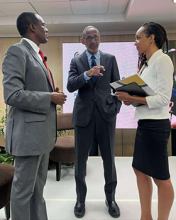 Minister of Finance and Public Service Dr Nigel Clarke, Caribbean Policy Research Institute (CAPRI) Executive Director Dr Damien King, and CAPRI Director of Strategy Yentyl Williams engage in conversation